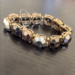 Elegant Gold and Silver Bracelet